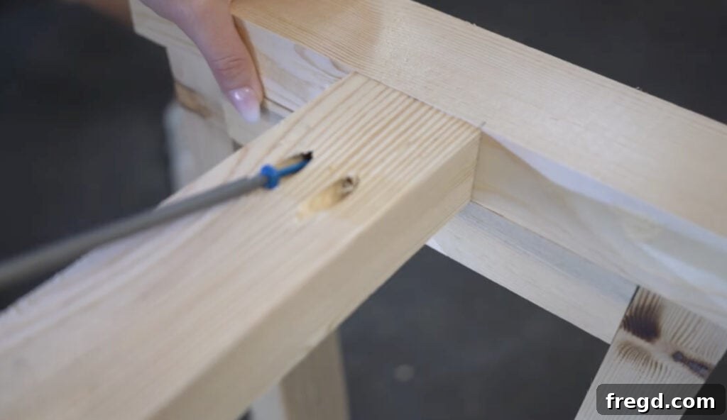 Ensuring flush alignment when connecting the support board to the leg base.