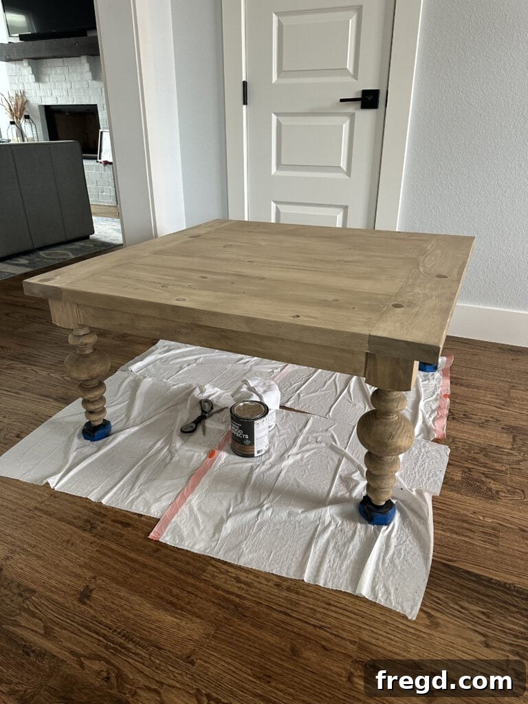 The coffee table showcasing its completed two-tone stain finish