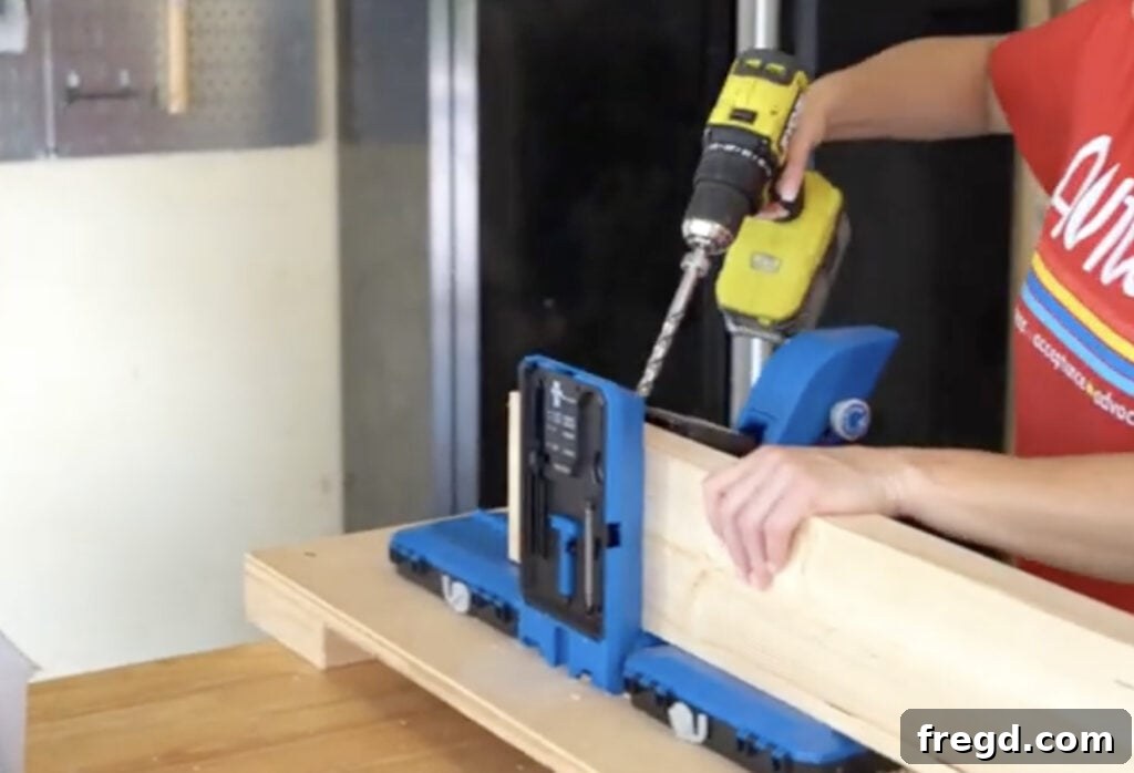 Drilling pocket holes into the individual planks for the tabletop