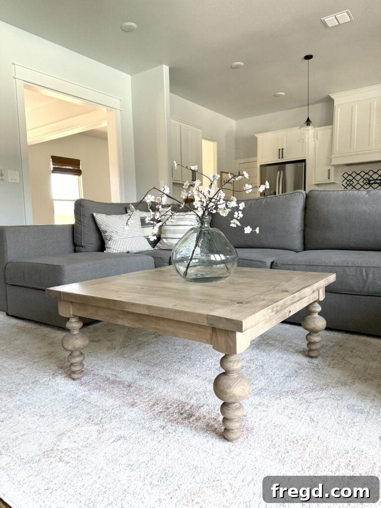 Detailed shot of the coffee table's surface adorned with decorative elements