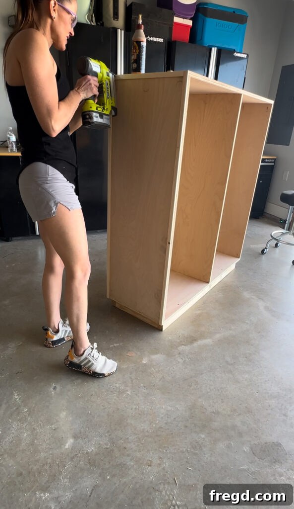 Craft Your Own Custom Dresser 11 Attaching vertical decorative trim to the dresser side panel