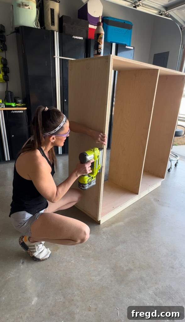 Craft Your Own Custom Dresser 12 Horizontal decorative trim being applied to the dresser side