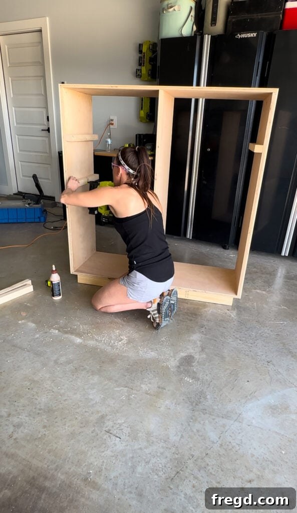 Craft Your Own Custom Dresser 13 Installing outside drawer spacers on the dresser frame