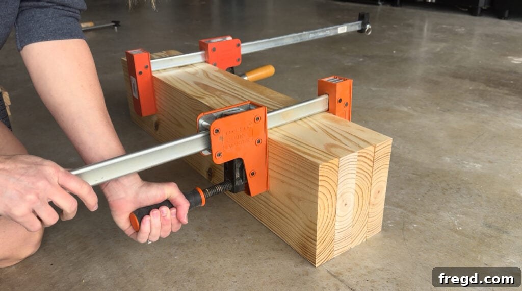 Clamped wood leg assemblies drying after lamination