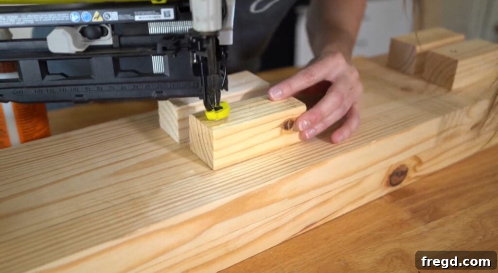 Attaching wood spacers to leg assemblies with nails and glue