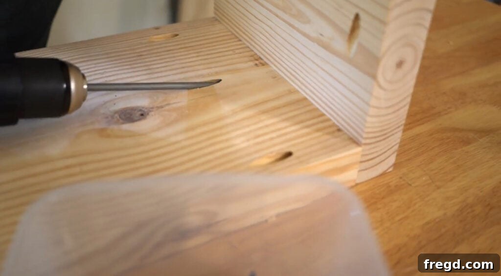 Assembling outside panels to the top middle plank using pocket holes