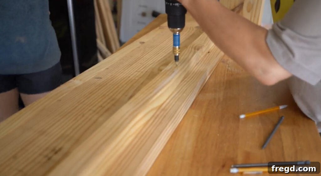 Drilling pilot holes on narrow wood planks for top trim