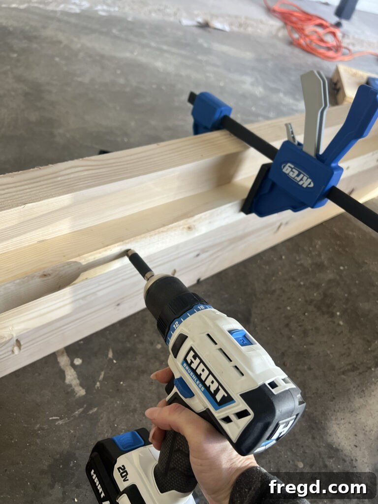 Build Your Own Twin Platform Bed 11 Measuring the placement of cleats on the bed frame side.