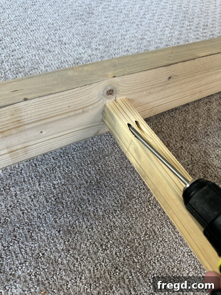 Installing the middle support for the mattress frame