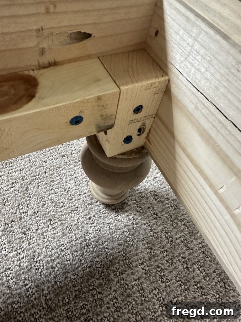 Attaching the beautiful turned wood feet