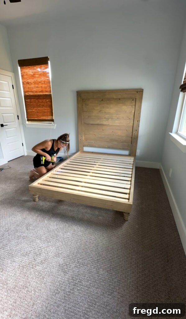 Adding the mattress slats to the bed frame