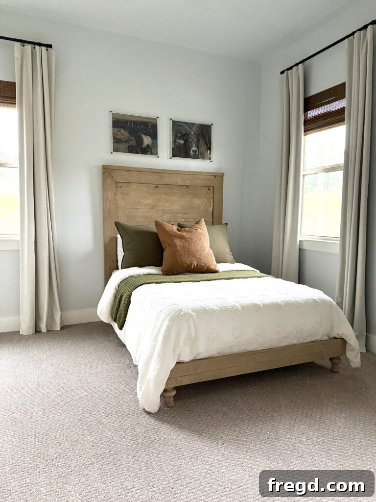 Another perspective of the charming guest room with the handmade bed
