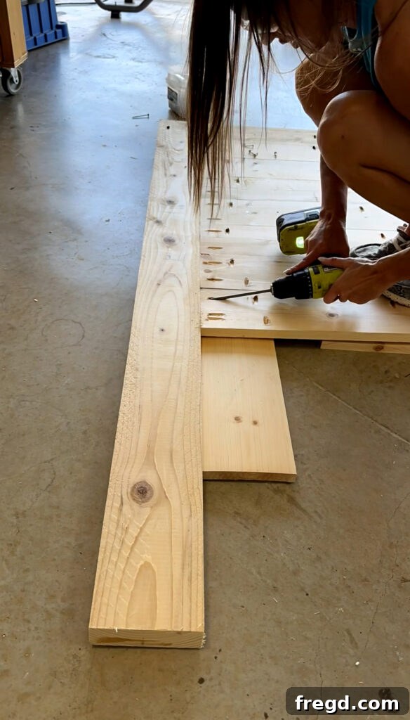 Attaching the planked panel to the headboard frame