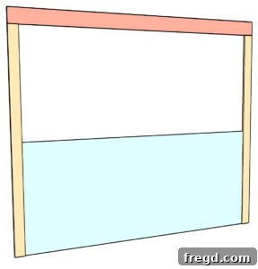 Removable Modern Accent Wall DIY for Renters 28 Plywood panel being attached to the wall with finish nails.