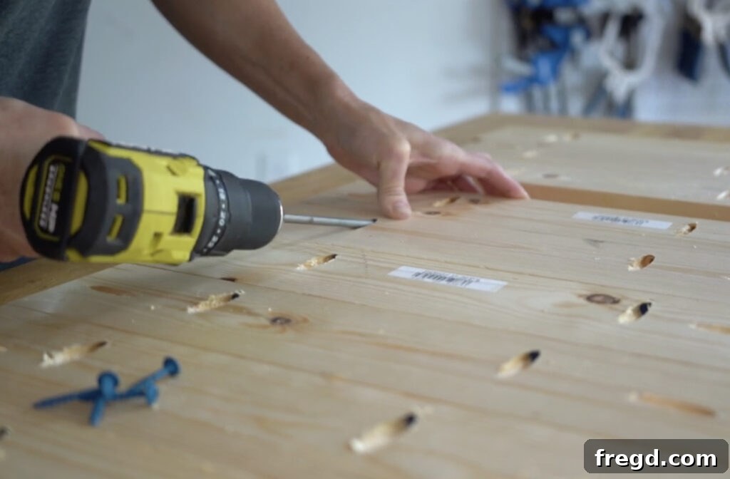 Detailed shot of pocket hole screws securing wood planks