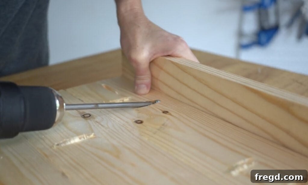 Attaching the top trim to the main planter panel