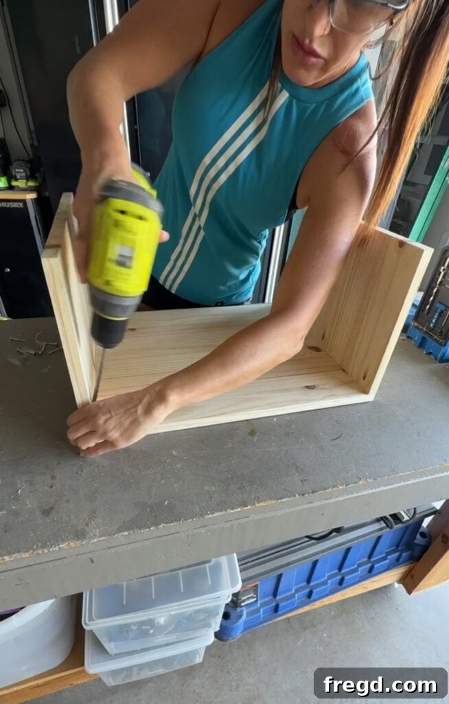 Easy Wood Nightstand Builds for Newbies 4 Assembled nightstand frame showing the bottom board attached between the side panels using pocket hole screws.