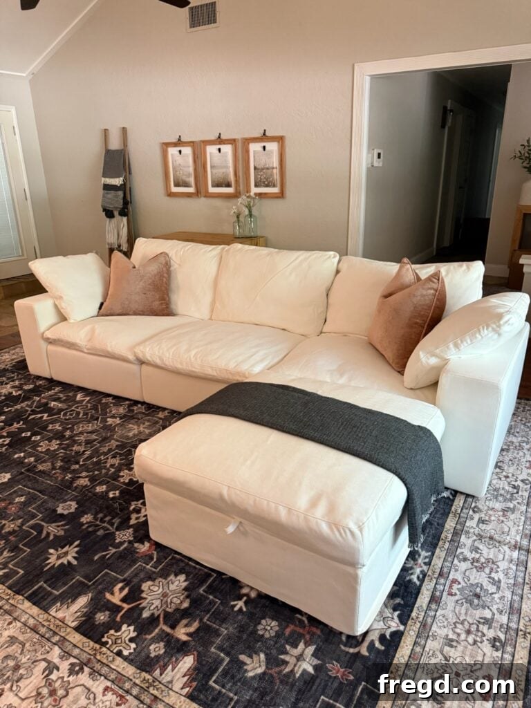 A second view of the VorthioHome sectional, showcasing its storage ottoman and modular capability in a cozy, well-lit room.