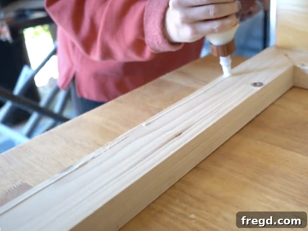 Modern Waterfall Console Build It Yourself for Less Than 100 Dollars 11 Cutting side panels at 45-degree angles for the waterfall effect
