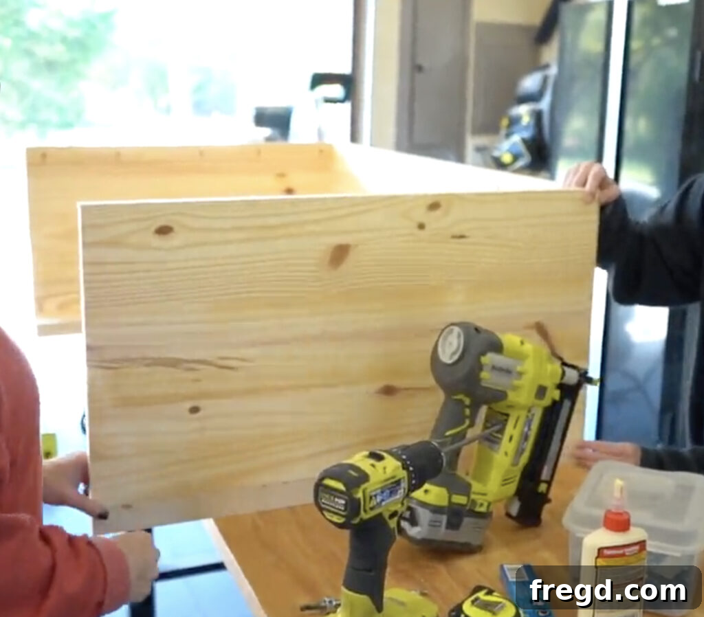 Modern Waterfall Console Build It Yourself for Less Than 100 Dollars 12 Drilling pocket holes along the inside edges of side panels