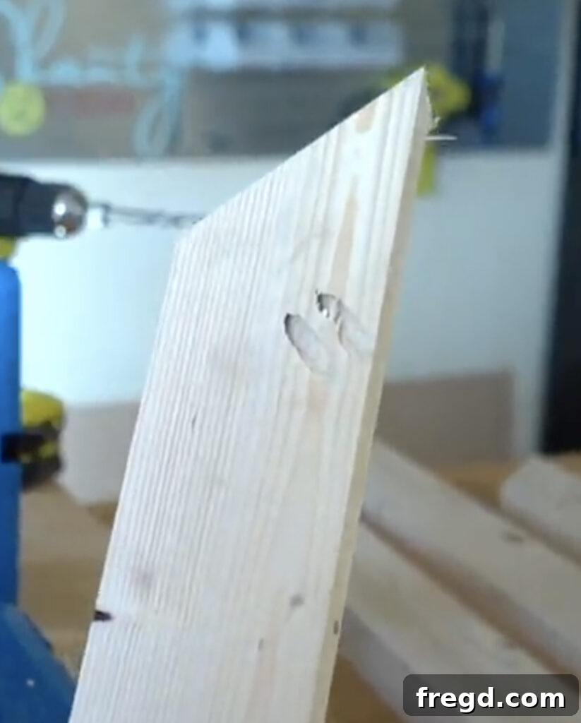 Modern Waterfall Console Build It Yourself for Less Than 100 Dollars 6 Drilling pocket holes into angled board ends