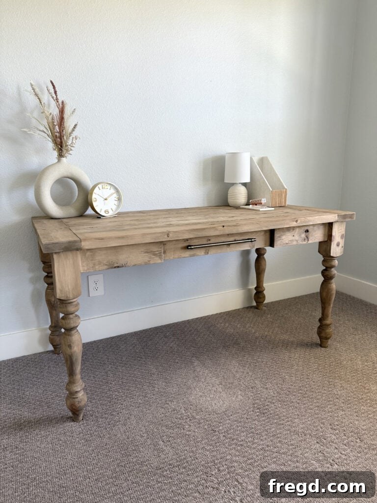 Another view of the DIY farmhouse desk in a styled home office