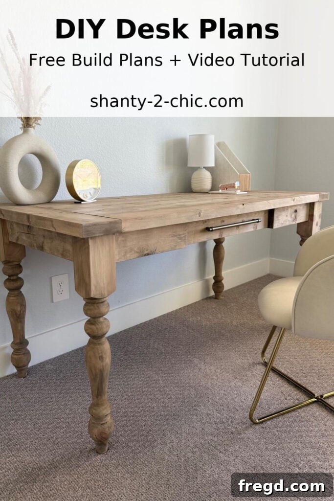 Inspiring shot of the completed DIY farmhouse desk with a plant