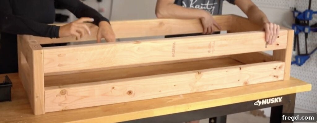 The fully assembled rectangular bench frame, constructed with 2x4s, ready for the next stages of the cowhide bench project.