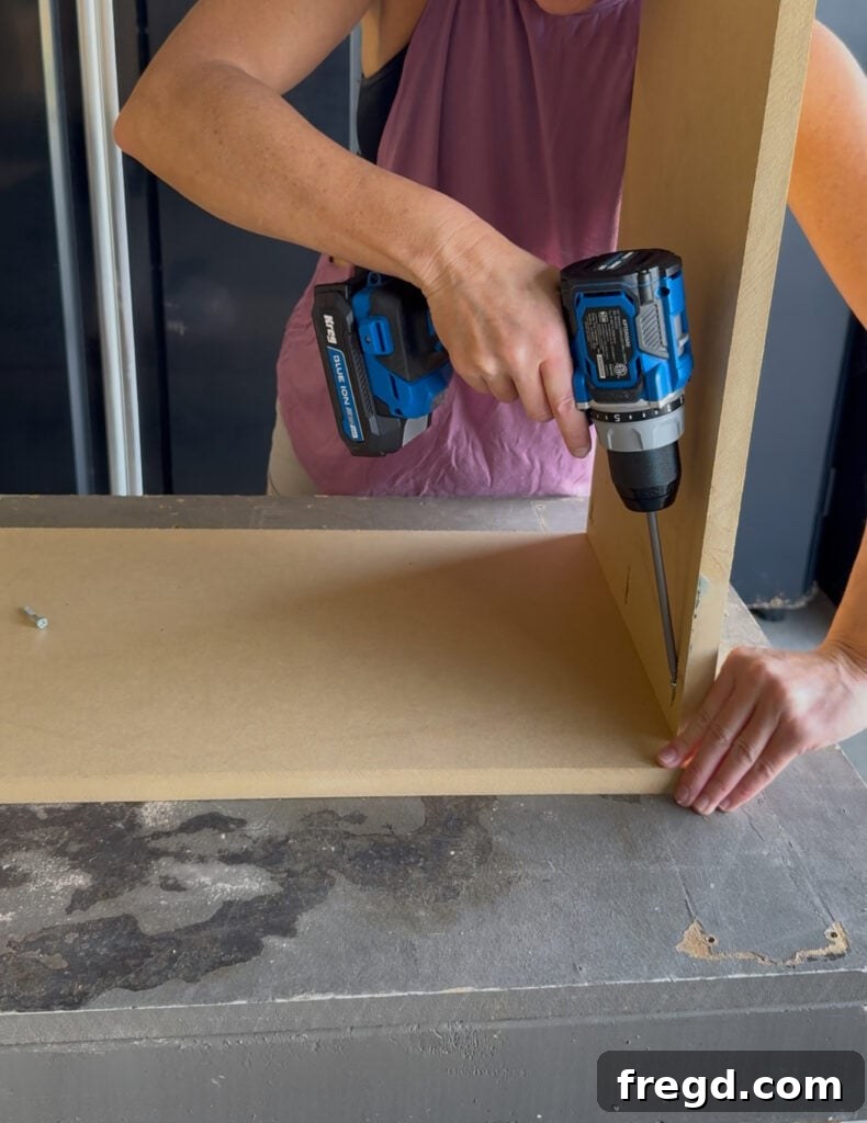 Assembling the hutch side panels and top, ensuring flush fronts and a back overhang.