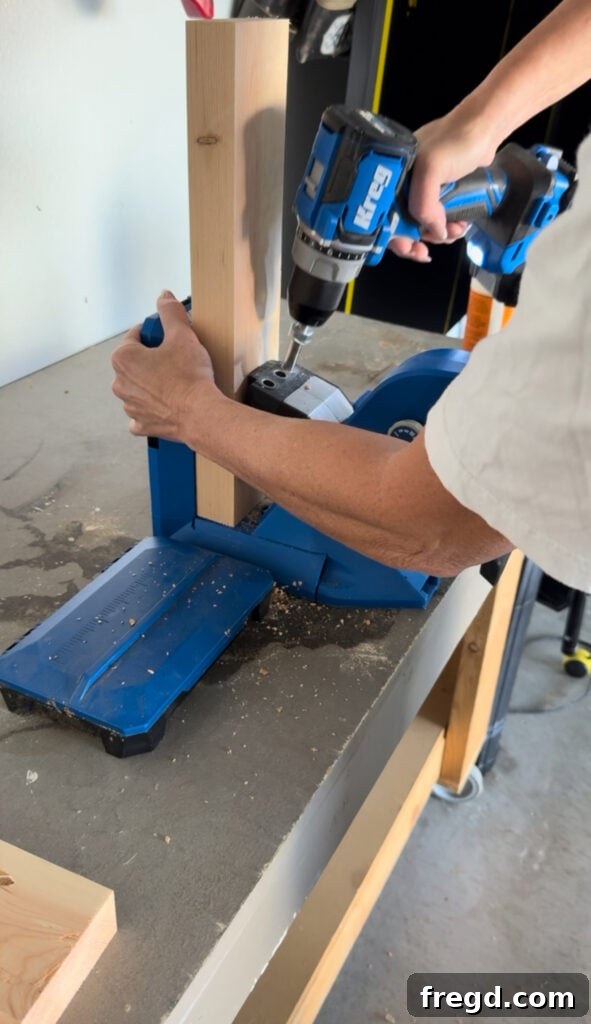 Drilling larger pocket holes into the apron pieces for the cabinet base.