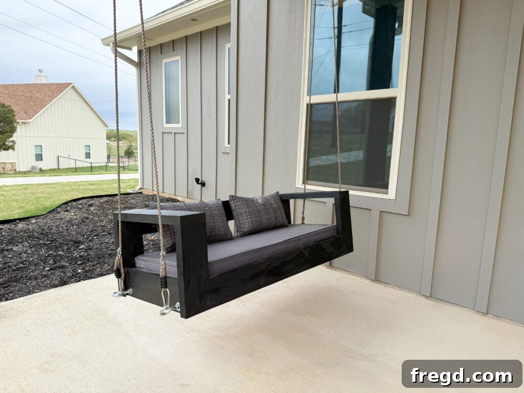 A comfortable and inviting DIY outdoor porch swing.