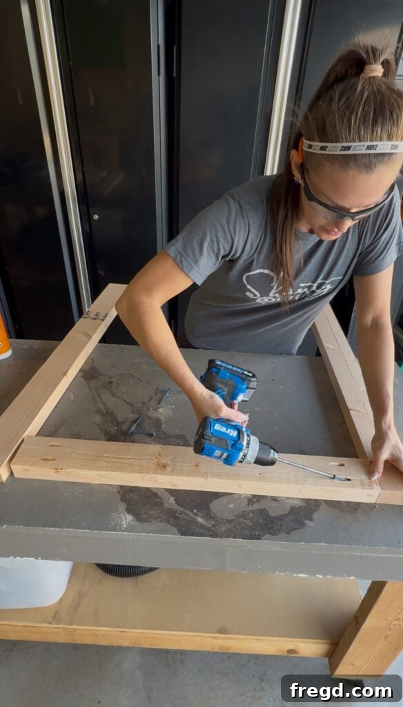Assembling the robust internal frame of the cabinet base using pocket holes.