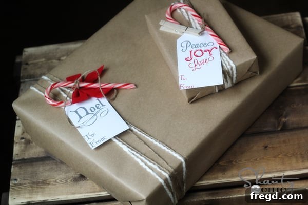 Elegant, rustic holiday wrapped gifts with candy canes and twine