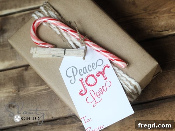 Close-up of a rustic gift wrapped with Kraft paper, jute twine, and a candy cane